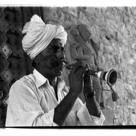 Pepe Khan playing a traditional folk instrument, surnai